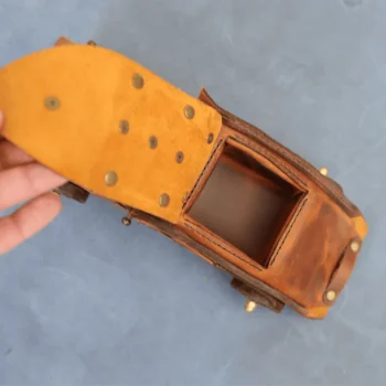 Leather car template top view with lid lifted to reveal compartment