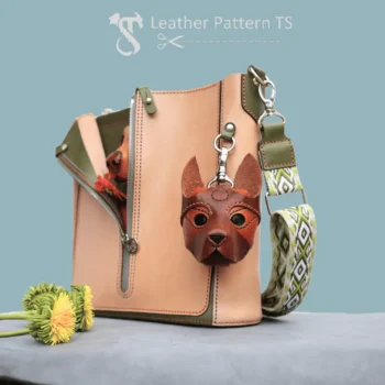 Dog shaped coin purse made using leather dog wallet pattern, hanging on bag