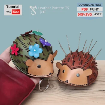 Hedgehog leather pattern – two example pincushions and bag pendants made from template, front view in hand