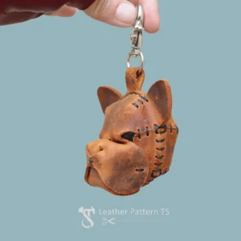 Side view of finished bulldog head keychain made using leather pattern template