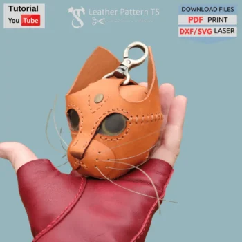 Leather cat mini wallet pattern – example of finished coin purse made from template, front view in hand