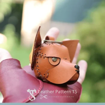 Close-up of grumpy chihuahua face keychain crafted using leather pattern template