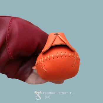 Tiger keychain template – bottom view of example leather bag charm from pattern