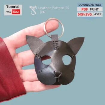 DIY cat keychain template front view showing black leather charm in hand
