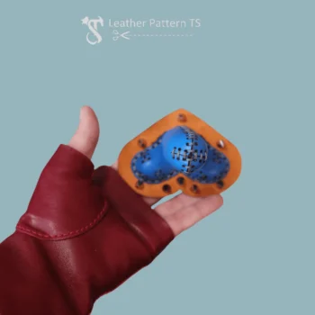 Phallic novelty pattern bottom view handheld with stitched leather base