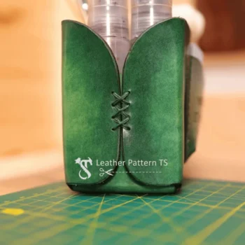 DIY leather pen stand template back view with laced detail holding jar