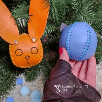 Printable leather toy template round blue ornament stitched with green thread
